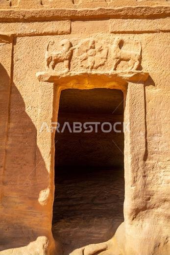 Carved ornamented entrance to the tomb at Jabal al banat complex, Hegra, Al Ula, Saudi Arabia