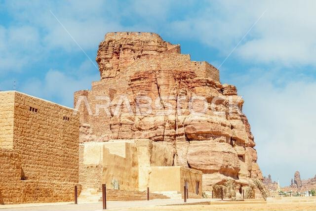 Al Ula old town ruined huts with city castle on the rock, Medina province, Saudi Arabia