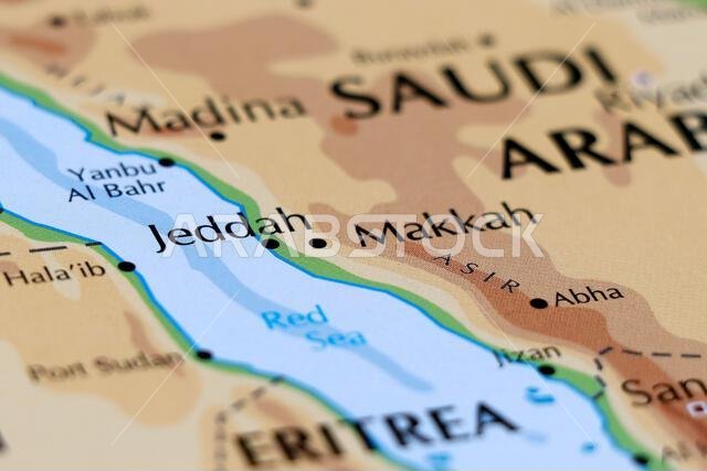 صورة مقرّبة لخريطة العالم مع التركيز على المملكة العربية السعودية، جدة، مكة المكرمة، والمدينة المنورة
