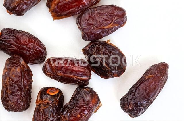 Delicious, dried dates isolated on white background