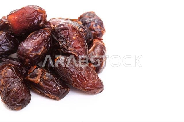 Delicious, dried dates isolated on white background