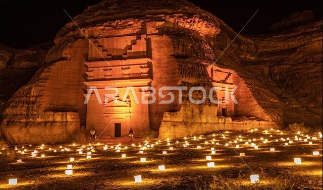 Ancient tombs of Hegra city illuminated during the night, Al Ula, Saudi Arabia Ancient tombs of Hegra city illuminated during the night, Al Ula, Saudi Arabia