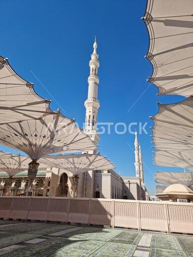 Madinah, Saudi Arabia - February 25, 2023: Muslim pilgrims visiting the beautiful An-Nabawi Mosque, the Prophet mosque which has great architecture du