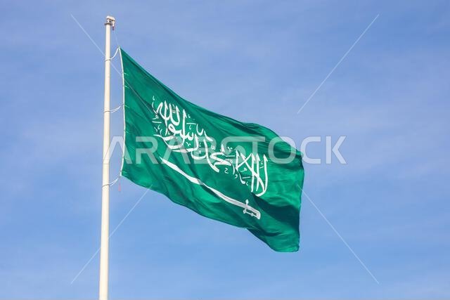 Saudi Arabian flag waving on the wind, Jeddah, Saudi Arabia Saudi Arabian flag waving on the wind, Jeddah, Saudi Arabia