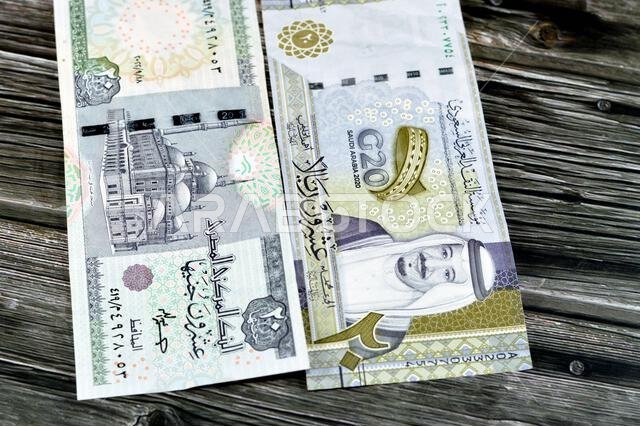 Saudi Arabia 20 SAR twenty riyals banknote with 20 LE twenty Egyptian pounds bills, Egyptian and Saudi money exchange rate with Muhammad Ali Mosque, P