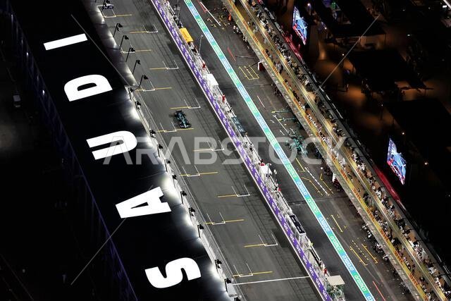 Jeddah, Saudi Arabia. 18th Mar, 2023. Lance Stroll (CDN) Aston Martin F1 Team AMR23 on track with team mate Fernando Alonso (ESP) Aston Martin F1 Team AMR23 in the pits. Formula 1 World Championship, Rd 2, Saudi Arabian Grand Prix, Saturday 18th March 2023. Jeddah, Saudi Arabia. Credit: James Moy/Alamy Live News