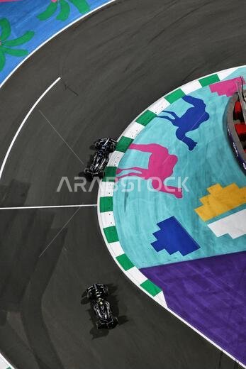 Jeddah, Saudi Arabia. 19th Mar, 2023. George Russell (GBR) Mercedes AMG F1 W14 leads team mate Lewis Hamilton (GBR) Mercedes AMG F1 W14. Formula 1 World Championship, Rd 2, Saudi Arabian Grand Prix, Sunday 19th March 2023. Jeddah, Saudi Arabia. Credit: James Moy/Alamy Live News