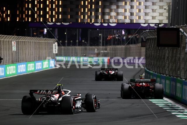 Jeddah, Saudi Arabia. 19th Mar, 2023. Zhou Guanyu (CHN) Alfa Romeo F1 Team C43 leads Nico Hulkenberg (GER) Haas VF-23. 19.03.2023. Formula 1 World Championship, Rd 2, Saudi Arabian Grand Prix, Jeddah, Saudi Arabia, Race Day. Photo credit should read: XPB/Press Association Images. Credit: XPB Images Ltd/Alamy Live News