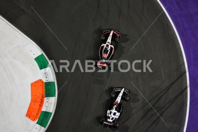 Jeddah, Saudi Arabia. 19th Mar, 2023. Kevin Magnussen (DEN) Haas VF-23 leads team mate Nico Hulkenberg (GER) Haas VF-23. Formula 1 World Championship, Rd 2, Saudi Arabian Grand Prix, Sunday 19th March 2023. Jeddah, Saudi Arabia. Credit: James Moy/Alamy Live News