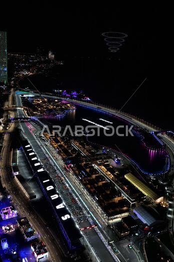 جدة، المملكة العربية السعودية. ١٩ مارس ٢٠٢٣. أجواء حلبة السباق - عرض ضوئي بطائرة بدون طيار. بطولة العالم للفورمولا ١، الجولة الثانية، جائزة السعودية الكبرى، الأحد ١٩ مارس ٢٠٢٣. جدة، المملكة العربية السعودية. حقوق الصورة: جيمس موي/ألامي لايف نيوز