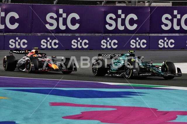 Jeddah, Saudi Arabia. 19th Mar, 2023. Fernando Alonso (ESP) Aston Martin F1 Team AMR23 leads Sergio Perez (MEX) Red Bull Racing RB19. 19.03.2023. Formula 1 World Championship, Rd 2, Saudi Arabian Grand Prix, Jeddah, Saudi Arabia, Race Day. Photo credit should read: XPB/Press Association Images. Credit: XPB Images Ltd/Alamy Live News