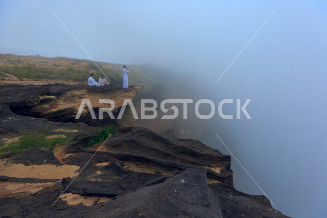 Creative image of a rugged mountain peak, a landscape of the mountains in Saudi Arabia, camping and overnighting on the tops of the mountains, adventures and tourist activities