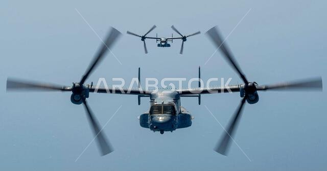 U.S. Marine Corps MV-22Bs assigned to Marine Medium Tiltrotor Squadron 266 (VMM-266) fly behind a KC-130J over the Red Sea, March 4, 2023. VMM-266 conduced air to air refueling between MV-22Bs and KC-130Js assigned to the Air Combat Element Crisis Response-Afirca 23.1 en route to Saudi Arabia for delivery to a shipping vessel. The movement was part of a planned MV-22B exchange between deployed theater aircraft due for depot level maintenance and their replacements in theater. (U.S. Air Force pho