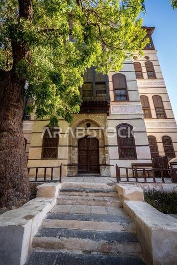 View of the ornate facade of the Nasseef coral town house, Souk al Alawi Street in the historic district of Al-Balad, Jeddah, Saudi Arabia, KSA