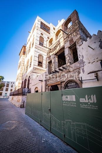 Exterior view of a dilapidated traditional residential town house being renovated by the Ministry of Culture, Al-Balad, Jeddah, KSA, Saudi Arabia