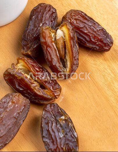 Raw Organic Medjool Dates (Kurma in Indonesia). It's also Ramadan "Iftar". Ramadan Kareem. Top View. Place for text.
