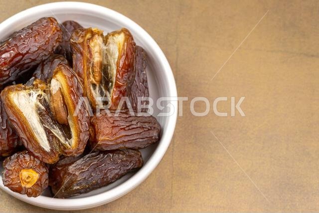 Raw Organic Medjool Dates (Kurma in Indonesia). It's also Ramadan "Iftar". Ramadan Kareem. Top View. Place for text.