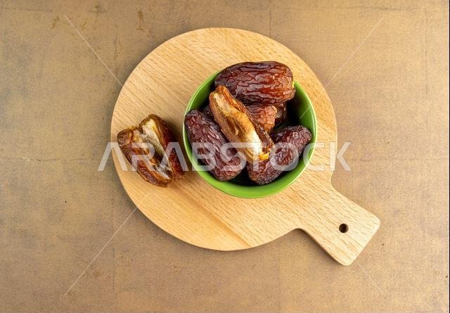 Raw Organic Medjool Dates (Kurma in Indonesia). It's also Ramadan "Iftar". Ramadan Kareem. Close up.