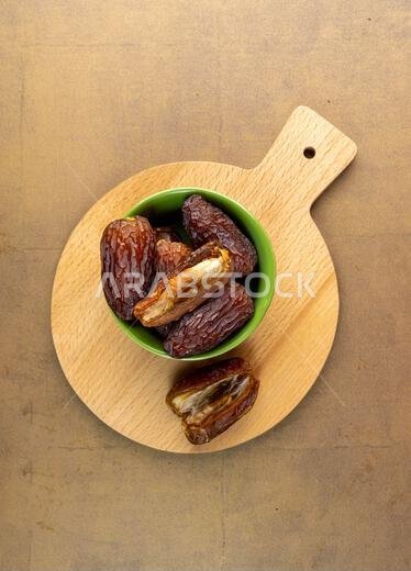 Raw Organic Medjool Dates (Kurma in Indonesia). It's also Ramadan "Iftar". Ramadan Kareem. Close up.