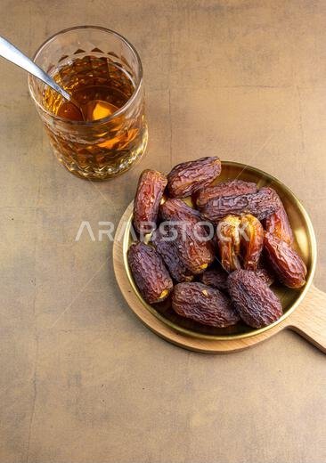 Raw Organic Medjool Dates (Kurma in Indonesia). It's also Ramadan "Iftar". Ramadan Kareem. Close up.
