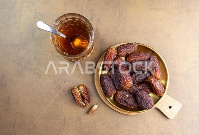 Raw Organic Medjool Dates (Kurma in Indonesia). It's also Ramadan "Iftar". Ramadan Kareem. Close up.
