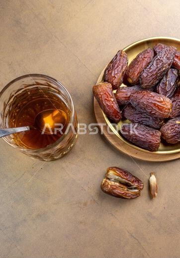 Raw Organic Medjool Dates (Kurma in Indonesia). It's also Ramadan "Iftar". Ramadan Kareem. Close up.