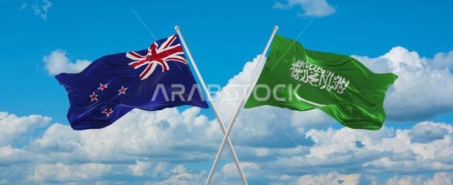 علمان متقاطعان، علم السعودية وعلم نيوزيلندا، يرفرفان في مهب الريح تحت سماء ملبدة بالغيوم. يرمز هذا العمل الفني إلى مفهوم العلاقة والحوار والسفر بين البلدين. رسم ثلاثي الأبعاد علمان متقاطعان، علم السعودية وعلم نيوزيلندا، يرفرفان في مهب الريح تحت سماء ملبدة بالغيوم. يرمز هذا العمل الفني إلى مفهوم العلاقة والحوار والسفر بين البلدين. رسم ثلاثي الأبعاد