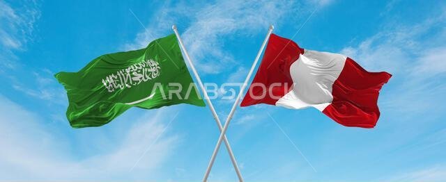 علمان متقاطعان، علم بيرو وعلم السعودية، يرفرفان في مهب الريح تحت سماء ملبدة بالغيوم. يرمز هذا العمل الفني إلى مفهوم العلاقة والحوار والسفر بين البلدين. رسم ثلاثي الأبعاد.
