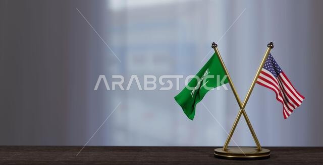 Saudi Arabia and USA flags on table. Negotiation between Saudi Arabia and United States. on little blur background. 3D work and 3D image
