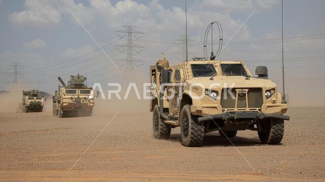 U.S. Marines with Combat Logistics Regiment 1, 1st Marine Logistics Group, stage their vehicles after the completion of the first leg of a convoy at a combat support center established in Kingdom of Saudi Arabia during exercise Native Fury 22, Aug. 14, 2022. Native Fury 22 is vital for strengthening the U.S. long-standing relationship with Saudi Armed Forces. The exercise enhances combined tactics, maritime capabilities and promotes long-term regional stability. KSA,MARCENT,NATIVEFURY22,Saudi Ar U.S. Marines with Combat Logistics Regiment 1, 1st Marine Logistics Group, stage their vehicles after the completion of the first leg of a convoy at a combat support center established in Kingdom of Saudi Arabia during exercise Native Fury 22, Aug. 14, 2022. Native Fury 22 is vital for strengthening the U.S. long-standing relationship with Saudi Armed Forces. The exercise enhances combined tactics, maritime capabilities and promotes long-term regional stability. KSA,MARCENT,NATIVEFURY22,Saudi Ar