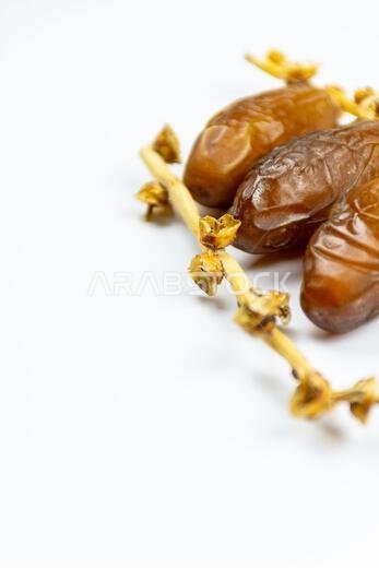 Close-up of Algerian royal dates on a white background. Ramadan concept.