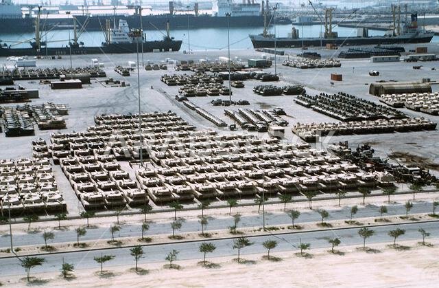 M-1A1 Abrams main battle tanks, foreground, and other armoured vehicles line a pier in preparation for redeployment to the United States in the aftermath of Operation Desert Storm. Subject Operation/Series: DESERT STORM Country: Saudi Arabia (SAU) M-1A1 Abrams main battle tanks, foreground, and other armoured vehicles line a pier in preparation for redeployment to the United States in the aftermath of Operation Desert Storm. Subject Operation/Series: DESERT STORM Country: Saudi Arabia (SAU)