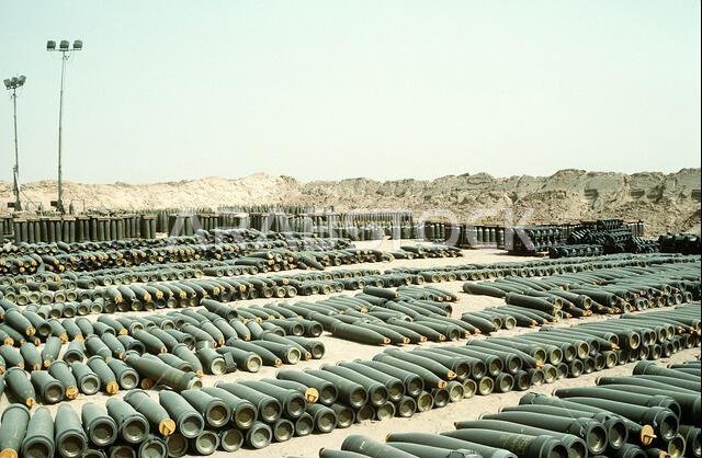Rows of 155mm howitzer projectiles line a holding area at Ammo Supply Point 3 near Mishab. The ordnance is being stored in preparation for shipment back to the United States in the aftermath of Operation Desert Storm. Subject Operation/Series: DESERT STORM Country: Saudi Arabia (SAU) Rows of 155mm howitzer projectiles line a holding area at Ammo Supply Point 3 near Mishab. The ordnance is being stored in preparation for shipment back to the United States in the aftermath of Operation Desert Storm. Subject Operation/Series: DESERT STORM Country: Saudi Arabia (SAU)