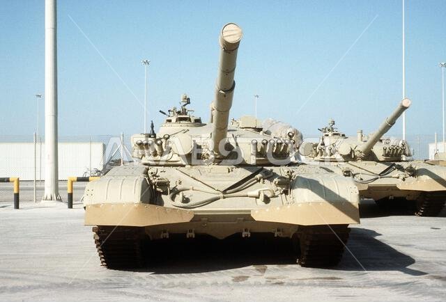 Kuwaiti T-72 main battle tanks, made in Yugoslavia, are stored at a Saudi base during Operation Desert Shield until they can be returned after the liberation of Kuwait from Iraqi forces. Subject Operation/Series: DESERT SHIELD Country: Saudi Arabia(SAU)