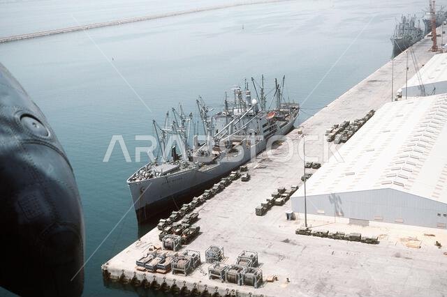 The Military Sealift Command-chartered freighter CAPE BOVER (T-AK-5057) is docked at pierside in preparation for taking on equipment and ordnance for redeployment to the United States in the aftermath of Operation Desert Storm. Subject Operation/Series: DESERT STORM Country: Saudi Arabia (SAU)