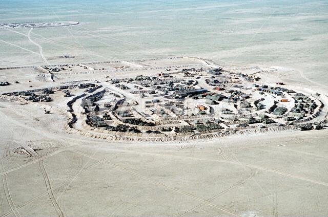 An aerial view of an Allied military encampment during Operation Desert Storm.. Subject Operation/Series: DESERT STORM Country: Saudi Arabia(SAU)