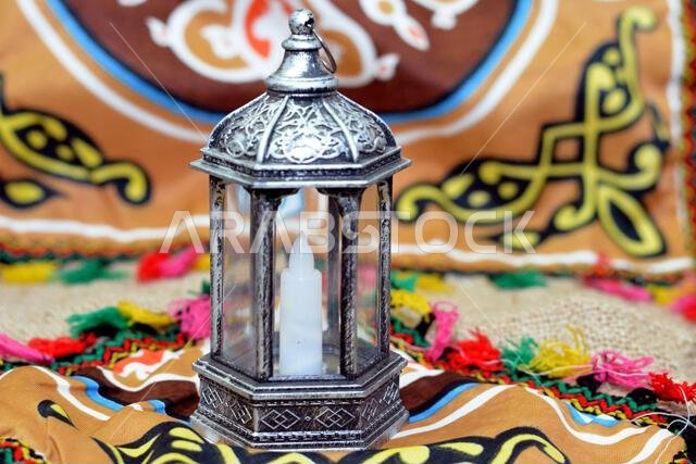 Ramadan Lantern lamp or Fanous Ramadan on a Ramadan background as a festive celebration of the Islamic fasting days in Arabian Islamic countries, reli