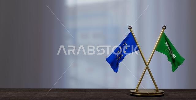 أعلام السعودية وأوروبا على طاولة. مفاوضات بين السعودية والاتحاد الأوروبي. على خلفية ضبابية قليلاً. عمل ثلاثي الأبعاد وصورة ثلاثية الأبعاد أعلام السعودية وأوروبا على طاولة. مفاوضات بين السعودية والاتحاد الأوروبي. على خلفية ضبابية قليلاً. عمل ثلاثي الأبعاد وصورة ثلاثية الأبعاد
