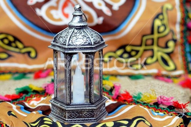 Ramadan Lantern lamp or Fanous Ramadan on a Ramadan background as a festive celebration of the Islamic fasting days in Arabian Islamic countries, reli