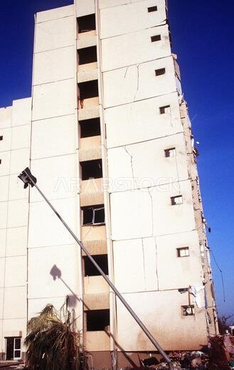 A view of the east side of the building that was severely bomb damaged in the Khobar Towers complex. The explosion of a fuel truck set off by terrorists at 2:55 p.m. EDT, Tuesday, June 25, 1996, outside the northern fence of the Khobar Towers complex near King Abdul Aziz Air Base, killed 19 and injured over 260. The facility housed U.S. service members and served as the headquarters for the 4404th Wing (Provisional), Southwest Asia. Subject Operation/Series: SOUTHERN WATCH Base: Dhahran Country: