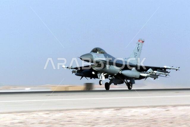 An F-16 Fighting Falcon aircraft takes off at Prince Sultan Air Base, Saudi Arabia, during Operation SOUTHERN WATCH. The Aircraft is part of the coalition forces of the 363rd Air Expeditionary Wing, Prince Sultan Air Base, Saudi Arabia, that enforces the no-fly and no-drive zone in Southern Iraq to protect and defend against Iraqi aggression. Subject Operation/Series: SOUTHERN WATCH Base: Prince Sultan Air Base Country: Saudi Arabia (SAU)