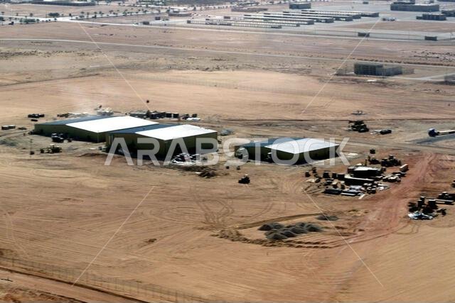 Aerial view of the Combine Air Operations Center (CAOC) at Prince Sultan Air Base, Saudi Arabia. The CAOC is a part of the coalition forces of the 363d Air Expeditionary Wing that enforces the no-fly and no-drive zone in Southern Iraq to protect and defend against Iraqi aggression. This mission is in direct support of Operation SOUTHERN WATCH. Subject Operation/Series: SOUTHERN WATCH Base: Prince Sultan Air Base Country: Saudi Arabia (SAU)