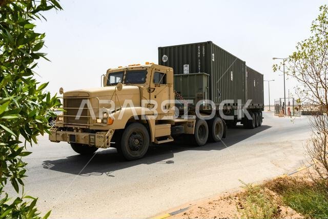 A convoy of U.S. Marines assigned to Combat Logistics Regiment 1, 1st Marine Logistics Group, and U.S. Soldiers assigned to 1st Theater Sustainment Command, arrives at Prince Sultan Air Base, Kingdom of Saudi Arabia, Aug. 16, 2022, during Exercise NATIVE FURY 22. In its 8th iteration, NF 22 is a biennial MARCENT-led exercise focused on the demonstration of the rapid offload and integration of a Maritime Pre-Positioned Force in the U.S. Central Command area of responsibility in support of regiona