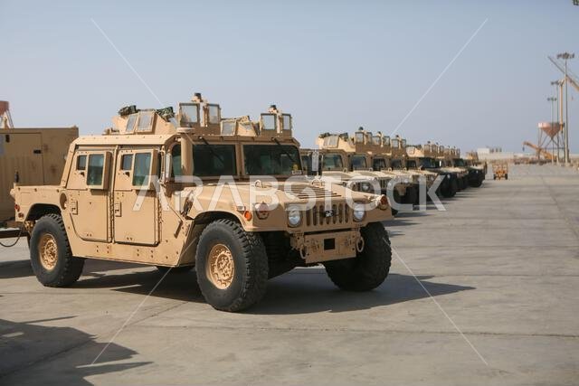 U.S. Marines with Combat Logistics Regiment 1, 1st Marine Logistics Group, stage vehicles in preparation for ship on-load during exercise Native Fury 22 at Yanbu Commercial Port, Kingdom of Saudi Arabia, Aug. 24, 2022. The Kingdom of Saudi Arabia enables the U.S. Marine Corps Central Command and U.S. Central Command to receive and employ forces and resources rapidly in the region through a growing network of western geographic access and staging points. KSA,MARCENT,NATIVEFURY22,Saudi Arabia,U.S.