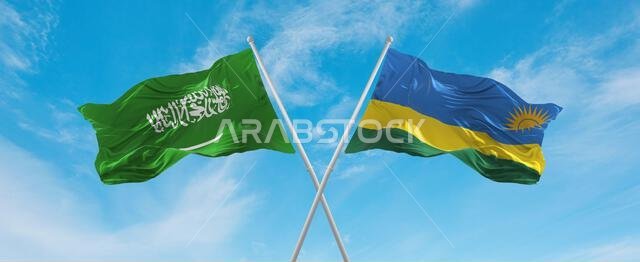 علمان متقاطعان، علم رواندا وعلم السعودية، يرفرفان في مهب الريح تحت سماء ملبدة بالغيوم. يرمز هذا العمل الفني إلى مفهوم العلاقة والحوار والسفر بين البلدين. رسم ثلاثي الأبعاد.