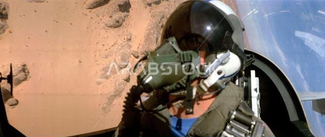 A self of CMDR. John Leenhouts, shot as he pilots an A-7E Corsair aircraft over the Saudi desert during low-level training. Leenhouts, a member of Attack Squadron 72 (VA-72), is based aboard the aircraft carrier USS JOHN F. KENNEDY (CV-67), which is on station in the Red Sea in support of Operation Desert Shield. Subject Operation/Series: DESERT SHIELD Country: Saudi Arabia (SAU)