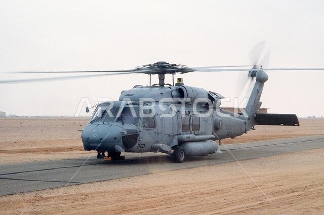 An HH-60H Sea Hawk helicopter from Helicopter Combat Search and Rescue/Special Warfare Support Squadron 4 (HCS-4) of Norfolk, Va., is prepared for a search and rescue mission at the start of Operation Desert Storm.. Subject Operation/Series: DESERT STORM Country: Saudi Arabia(SAU)