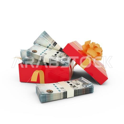Stack of Saudi riyal notes inside an open red gift box. Bundles of Saudi riyal inside box isolated on white background