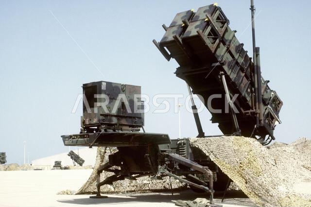 A view of a 7th Air Defense Artillery Brigade Patriot tactical air defense system missile launcher deployed during Operation Desert Shield. Another Patriot launcher is in the background. Subject Operation/Series: OPERATION DESERT SHIELD Country: Saudi Arabia (SAU)