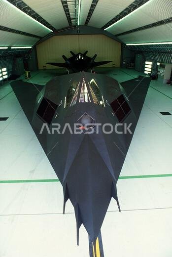 Two 37th Tactical Fighter Wing (37th TFW) F-117A aircraft sit inside a hangar during Operation Desert Shield. Subject Operation/Series: DESERT SHIELD Country: Saudi Arabia (SAU)